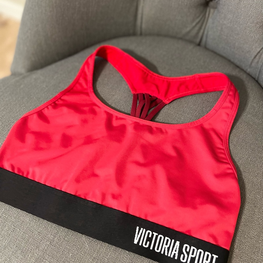Never worn black and red Victoria’s Secret sports bra